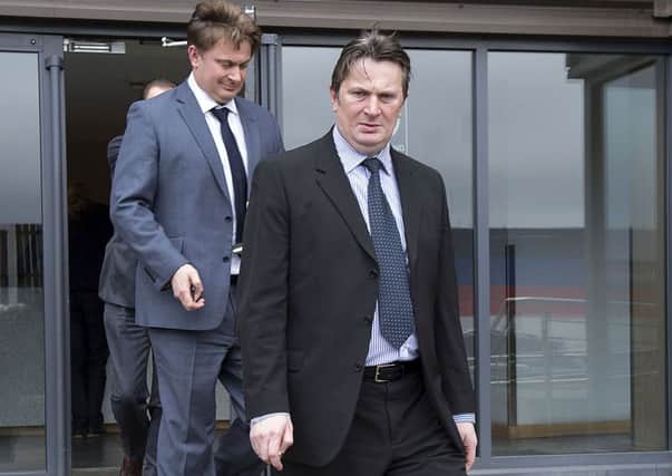 Rangers shareholders Sandy, right, and James Easdale leave Ibrox yesterday. Picture: Bill Murray/SNS
