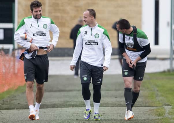 Celtic's Charlie Mulgrew, Leigh Griffiths and Scott Brown head down to training at Lennoxtown yesterday. Picture: SNS