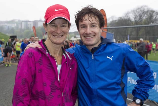 Race winner Chris Thompson celebrates with former world champion Sonia OSullivan. Picture: PA