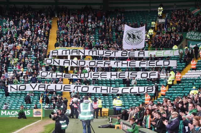 Celtic fans display a banner at yesterday's game. Picture: SNS