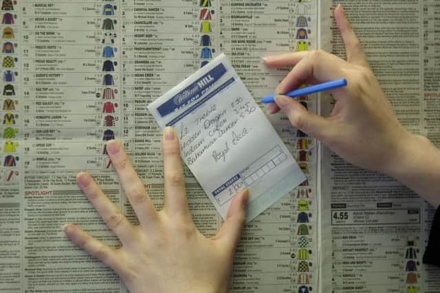 Bookmaker William Hill has already announced plans to close more than 100 shops. Picture: Ian Rutherford