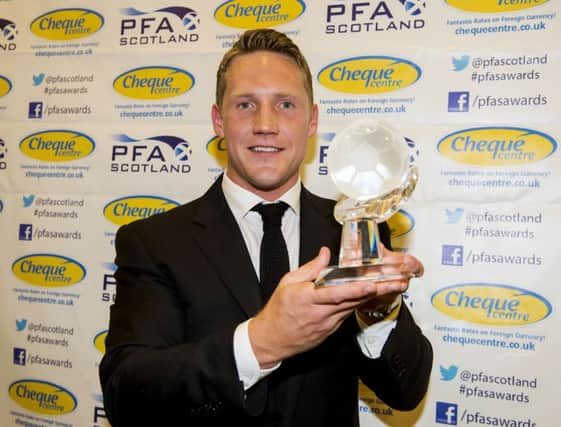 Celtic's star man Kris Commons with his award. Picture: SNS