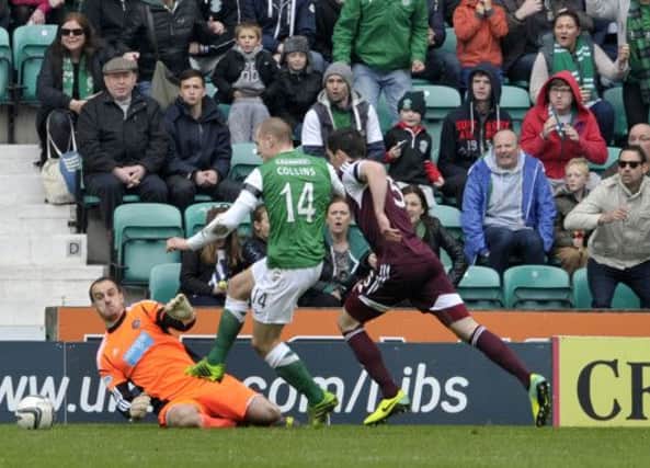 James Collins misses a golden opportunity to equalise in the Edinburgh derby on Sunday. Picture: Ian Rutherford