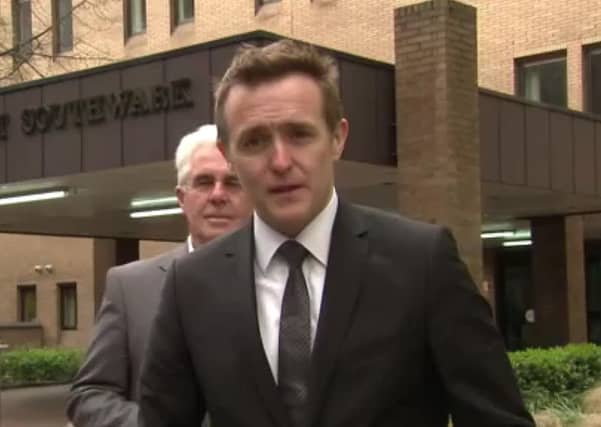Max Clifford is seen creeping up behind Sky News presenter Tom Parmenter during a pre-recorded broadcast. Picture: Sky News/YouTube