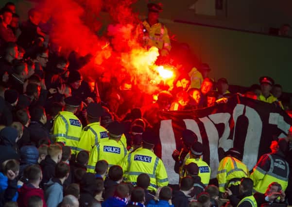 Flares and smoke bombs were seen in use at the Glasgow Cup final. Picture: SNS