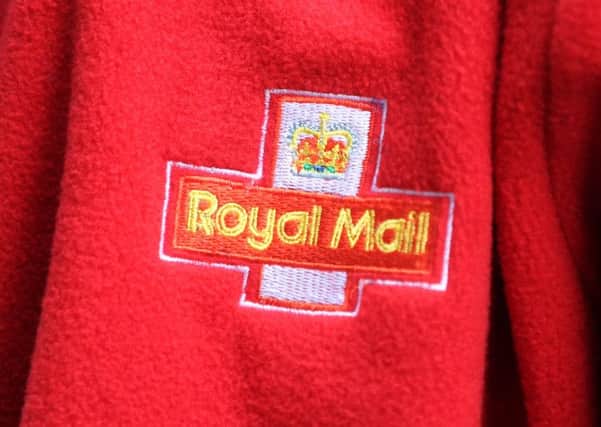 Vince Cable was challenged over the sale of the Royal Mail. Picture: PA