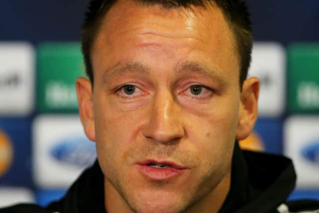 John Terry, addressing media yesterday, wants to stay at Chelsea for the rest of his career. Picture: Getty