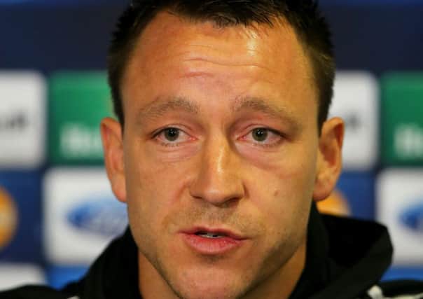 John Terry, addressing media yesterday, wants to stay at Chelsea for the rest of his career. Picture: Getty