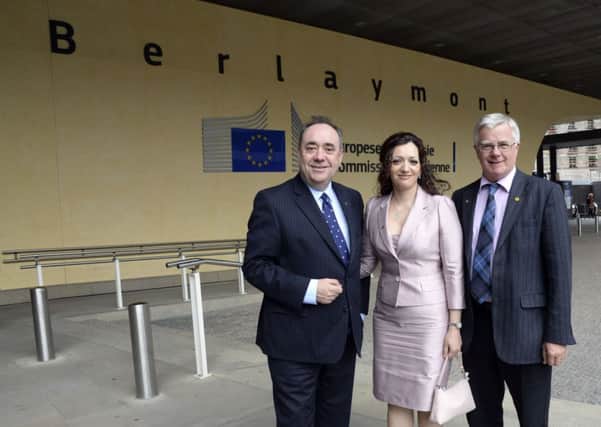 Alex Salmond with SNP President and MEP Ian Hudghton, right, and SNP MEP Candidate Tasmina Ahmed-Sheikh. Picture: Getty