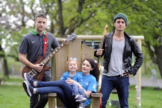 Celtic defender Adam Matthews, The Vaccines guitarist Freddie Cowan, Jamie-Leigh Smith, 14, and Katie Young, 3, help launch Let The Games Begin. Picture: John Devlin