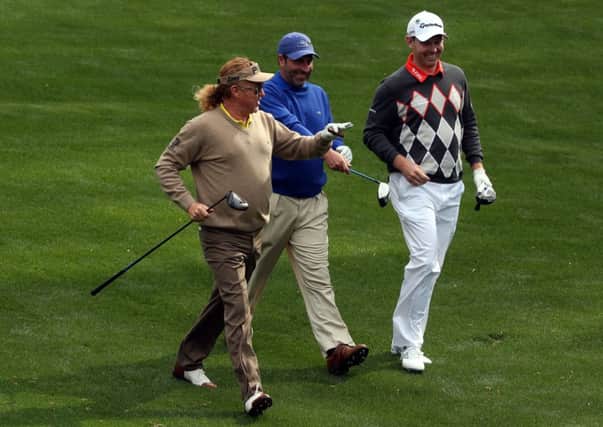 Stephen Gallacher, right, with Miguel Angel Jimenez and Jose Maria Olazabal at Augusta. Picture: Getty