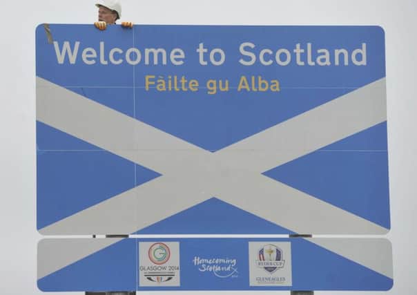 The new Border sign, complete with Commonwealth Games. Homecoming Scotland and Ryder Cup logos. Picture: Phil Wilkinson