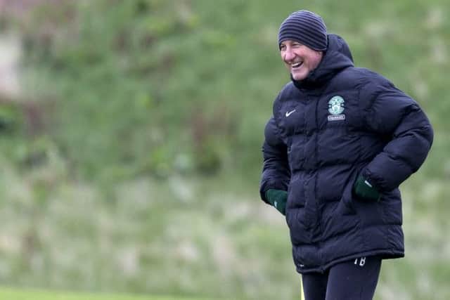 Despite his side's run of poor form, Terry Butcher was all smiles during training. Picture: SNS