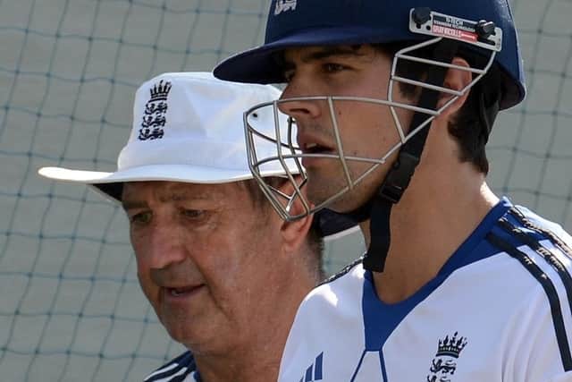 Graham Gooch, left, pictured at the nets with Alastair Cook, has been relieved of his duties. Picture: Getty