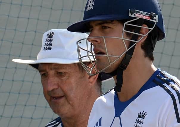 Graham Gooch, left, pictured at the nets with Alastair Cook, has been relieved of his duties. Picture: Getty