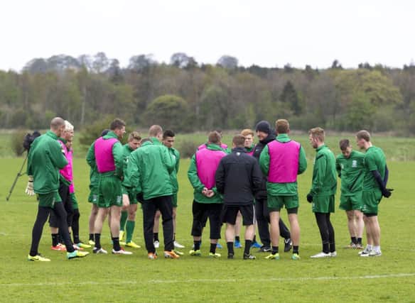 Terry Butcher marshals his troops during training at East Mains. Picture: SNS