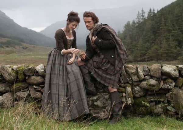 Caitriona Balfe and Sam Heughan as Claire Randall and Jamie Fraser in a promo shot from Outlander. Picture: Contributed