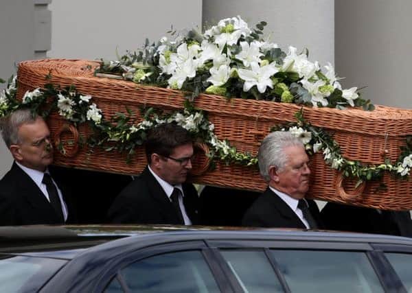 The coffin of author Sue Townsend leaves the De Montfort Hall following her funeral service in Leicester city centre. Picture: PA