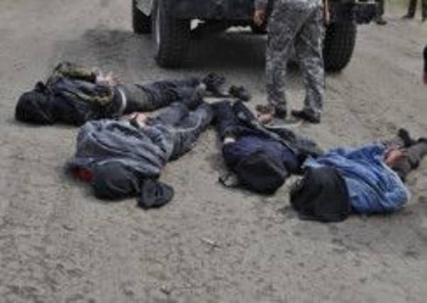 The Ukrainian Ministry of Defense announced that four pro-Russian separatists, who shot allegedly two Ukrainian helicopters down detained in Donetsk. Picture: Getty