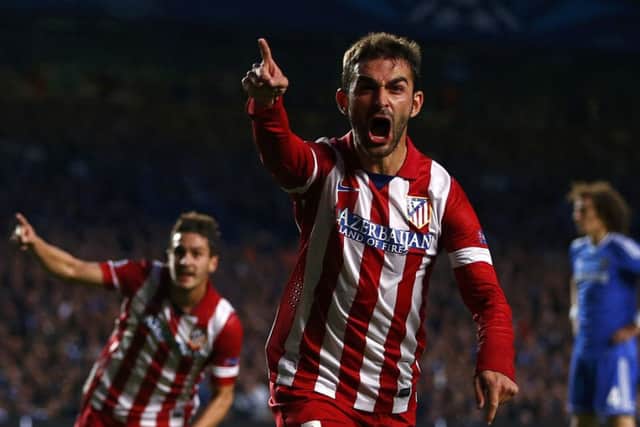 Atletico Madrids Adrian Lopez celebrates after scoring against Chelsea. Picture: Reuters
