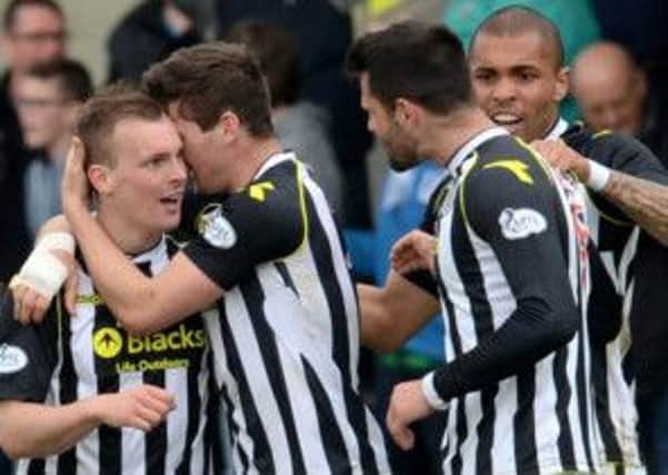Scorer Gregg Wylde, left, is congratulated by team-mates. Picture: Rob Casey/SNS