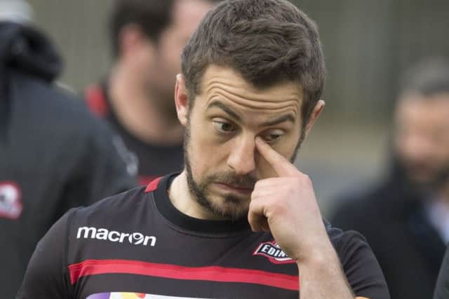 End of an era: Greig Laidlaw leaves the field after playing his last home match. Picture: SNS