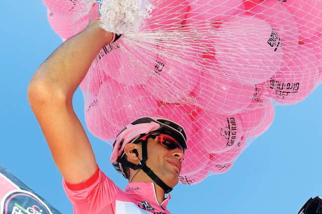 Last years winner, Vincenzo Nibali, celebrates in the Maglia Rosa (pink jersey). Picture: AFP
