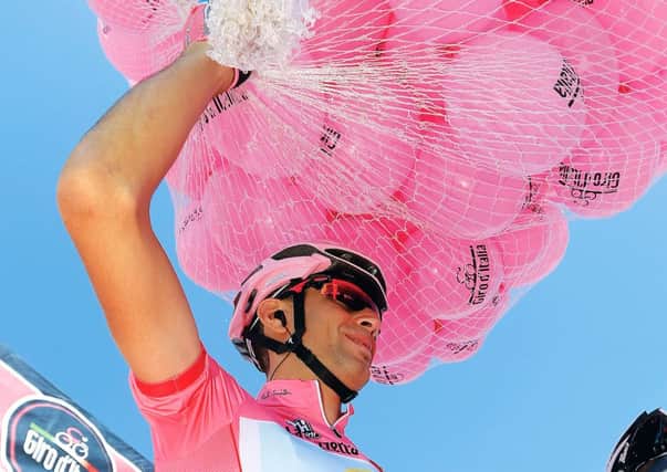 Last years winner, Vincenzo Nibali, celebrates in the Maglia Rosa (pink jersey). Picture: AFP