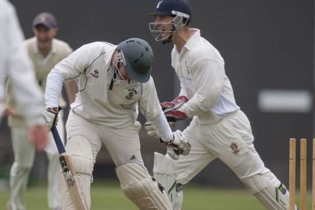 Andrew Bock of Grange celebrates bowling out Stoneywood-Dyces Mike Steinson. Picture: Toby Williams