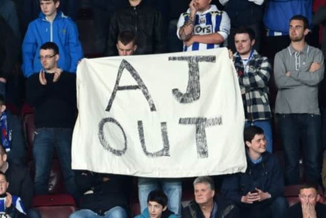 Kilmarnock fans display a banner calling for Johnston to be sacked. Picture: SNS