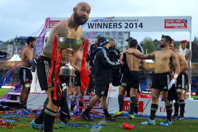 New Zealand skipper DJ Forbes shows off the winners trophy after his side blew  everyone away. Picture: Getty