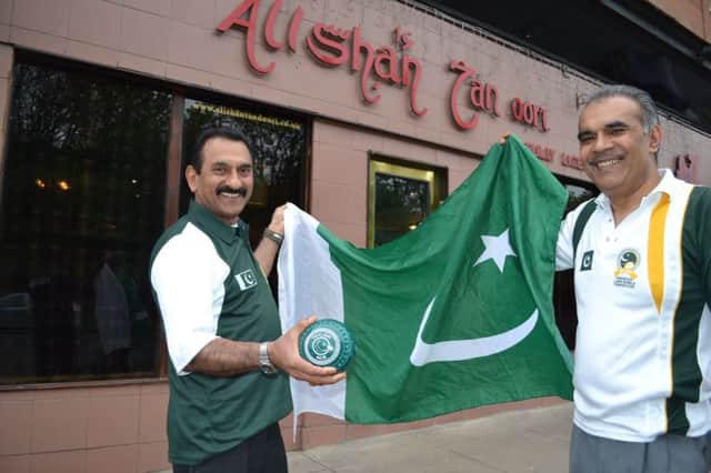 Ali Shan Muzahir, left, and Qureshi Mohammed celebrate selection for the Pakistan lawn bowls team for Glasgow 2014. Picture: Paul Drury