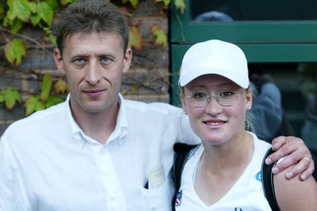 Elena with her father Sergei, who brought his family to the UK. Picture: PA