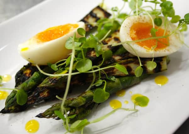 Asparagus, soft-boiled eggs, watercress and celery salt. Picture: Lee MacGregor