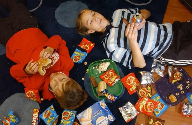 Junk food marketing is undermining parents efforts. Picture: Colin Hattersley