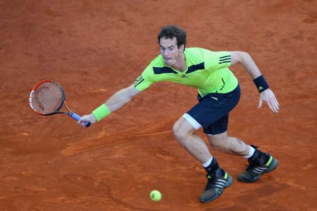 Andy Murray stretches for a forehand during his win over Nicolas Almagro at the Mutua Madrid Open. Picture: Getty