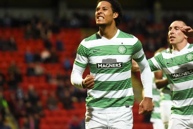 Virgil van Dijk celebrates scoring for Celtic. Picture: SNS