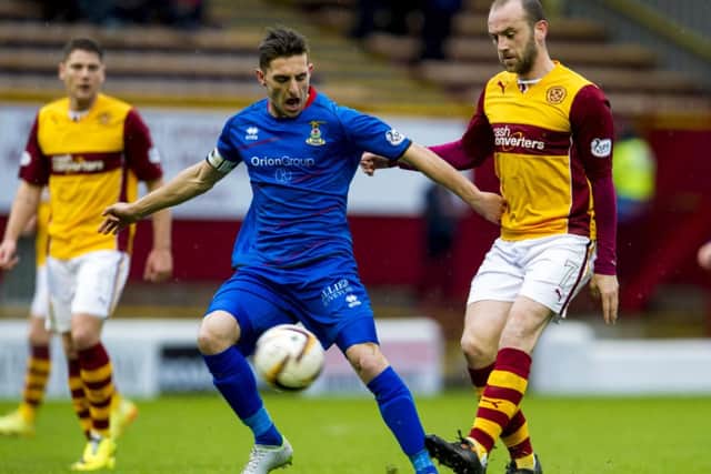 Motherwell's James McFadden (right) clashes with Graeme Shinnie. Picture: SNS