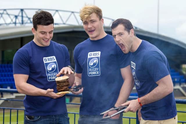 Matt Scott, left, and David Denton join Tim Visser, right, to promote RBSs RugbyForce initiative. Picture: SNS/SRU