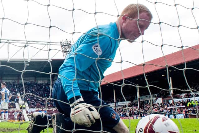 Kilmarnock goalkeeper Craig Samson lets in a fifth goal to Hearts at the weekend. Picture: SNS