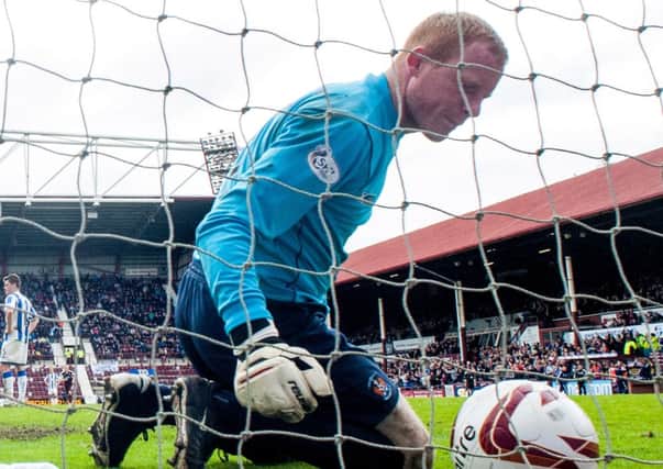 Kilmarnock goalkeeper Craig Samson lets in a fifth goal to Hearts at the weekend. Picture: SNS