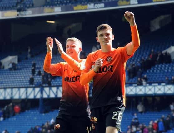 Andrew Robertson, left, and Ryan Gauld  celebrate their Scottish Cup victory over Rangers at Ibrox. Picture: Lisa Ferguson