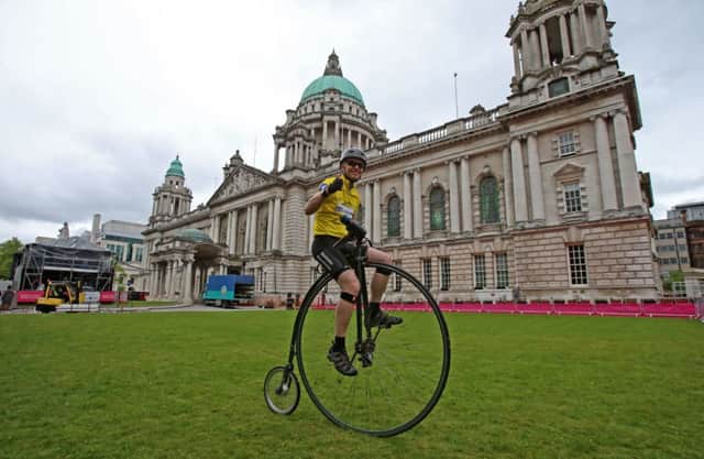 Cyclist Joff Summerfield, who circumnavigated the globe on a penny farthing, at Belfast City Hall. Picture: PA