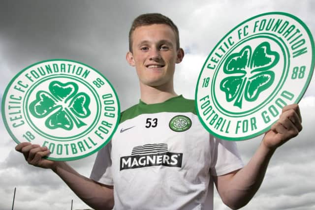 Liam Henderson publicises the Celtic Foundation charity collection against Dundee United. Picture: SNS