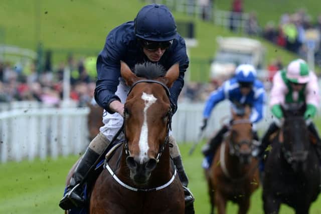 Orchestra and Ryan Moore won the Chester Vase. Picture: Martin Rickett/PA
