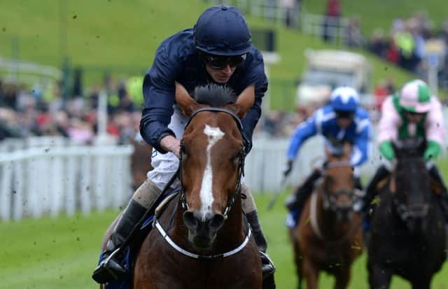 Orchestra and Ryan Moore won the Chester Vase. Picture: Martin Rickett/PA