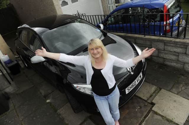 Lollipop lady Noleen McCormack has been inundated with calls after listing her Edinburgh driveway. Picture: Greg Macvean