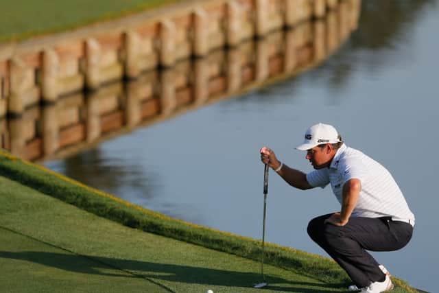 Lee Westwood lines up his putt on the fourth green at TPC Sawgrass. Picture: Kevin C Cox/Getty