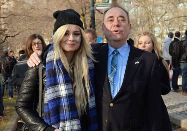 Alex Salmond walks with Scottish singer Nina Nesbitt in New York. Picture: Getty