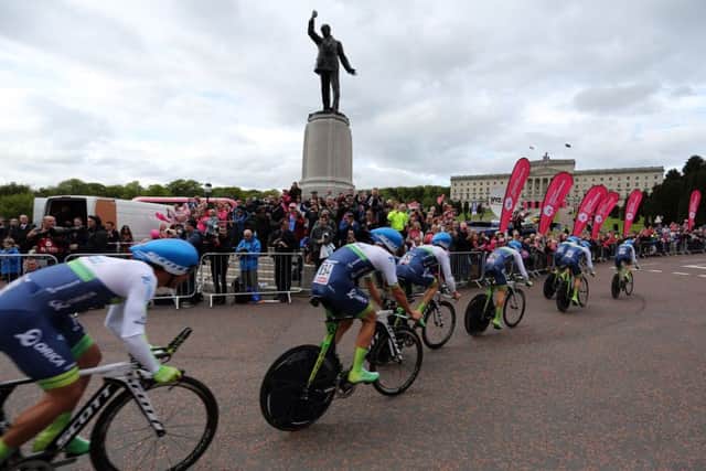 Orica GreenEdge enter the Stormont estate in Belfast during stage one of the Giro DItalia. Picture: PA